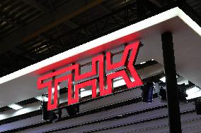 THK signage and logo